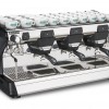 This image is a front-side view of the Rancilio Classe 7 S espresso machine in Anthracite Black, with 3 groups at traditional height with semi-automatic dosing.